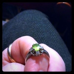 .925 Diamond and Peridot ring.